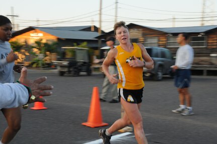 The Jingle Bell Run took place at Soto Cano Air Base, Dec. 16. Members basewide ran the nearly 3.5 mile run/walk enthusiastically adorning jingle bells and Santa hats. Morale Welfare and Recreation sponsored the event and t-shirts were awarded to the first 150 members who completed the run. American Forces News was also on scene videoing and interviewing participants. (U.S. Air Force photo/Staff Sgt. Kimberly R. Moore)