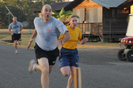 The Jingle Bell Run took place at Soto Cano Air Base, Dec. 16. Members basewide ran the nearly 3.5 mile run/walk enthusiastically adorning jingle bells and Santa hats. Morale Welfare and Recreation sponsored the event and t-shirts were awarded to the first 150 members who completed the run. American Forces News was also on scene videoing and interviewing participants. (U.S. Air Force photo/Staff Sgt. Kimberly R. Moore)