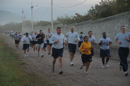 The Jingle Bell Run took place at Soto Cano Air Base, Dec. 16. Members basewide ran the nearly 3.5 mile run/walk enthusiastically adorning jingle bells and Santa hats. Morale Welfare and Recreation sponsored the event and t-shirts were awarded to the first 150 members who completed the run. American Forces News was also on scene videoing and interviewing participants. (U.S. Air Force photo/Staff Sgt. Kimberly R. Moore)