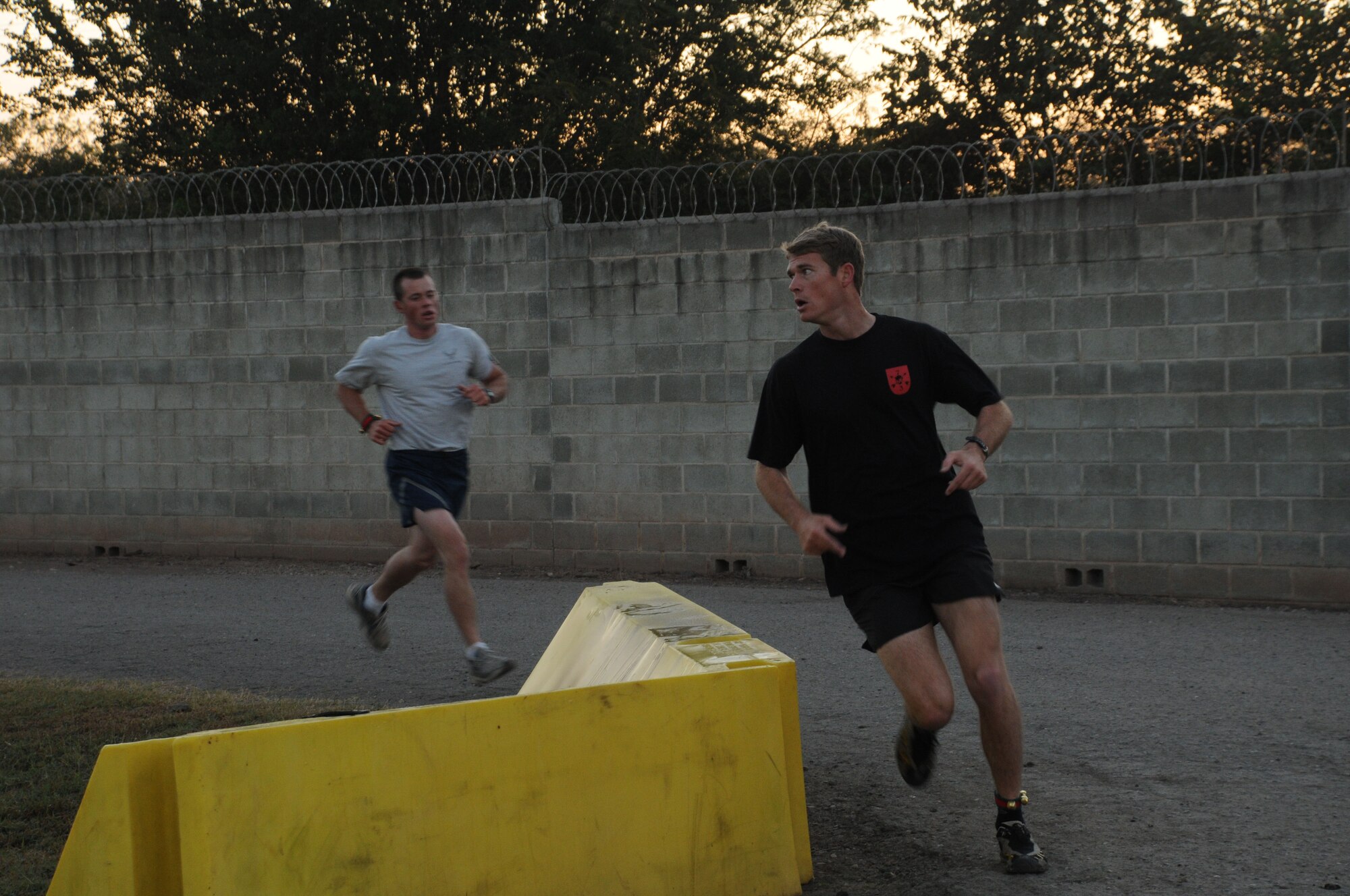 The Jingle Bell Run took place at Soto Cano Air Base, Dec. 16. Members basewide ran the nearly 3.5 mile run/walk enthusiastically adorning jingle bells and Santa hats. Morale Welfare and Recreation sponsored the event and t-shirts were awarded to the first 150 members who completed the run. American Forces News was also on scene videoing and interviewing participants. (U.S. Air Force photo/Staff Sgt. Kimberly R. Moore)