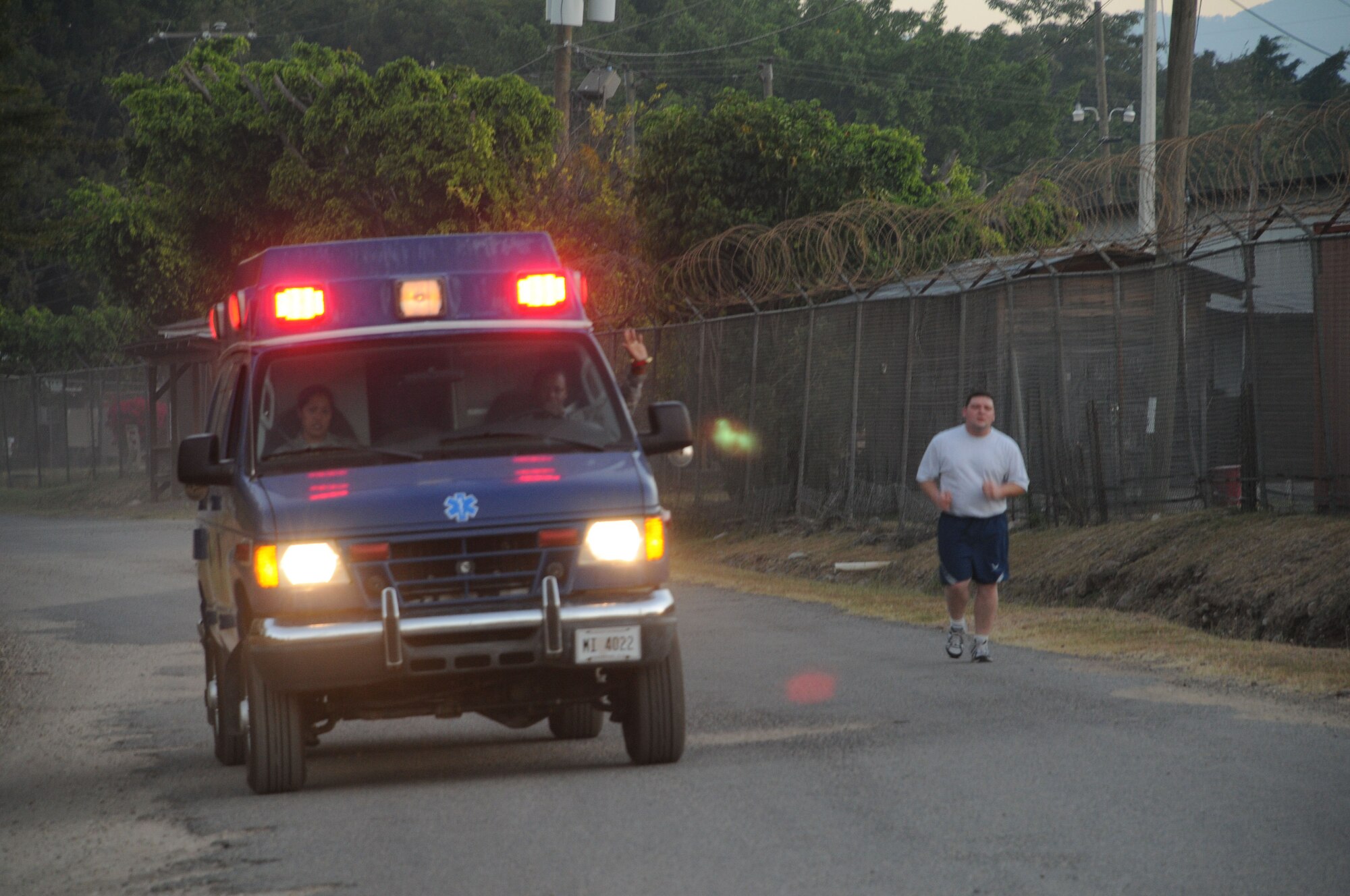 The Jingle Bell Run took place at Soto Cano Air Base, Dec. 16. Members basewide ran the nearly 3.5 mile run/walk enthusiastically adorning jingle bells and Santa hats. Morale Welfare and Recreation sponsored the event and t-shirts were awarded to the first 150 members who completed the run. American Forces News was also on scene videoing and interviewing participants. (U.S. Air Force photo/Staff Sgt. Kimberly R. Moore)