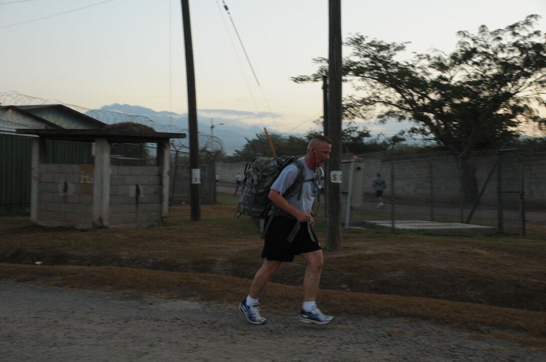 The Jingle Bell Run took place at Soto Cano Air Base, Dec. 16. Members basewide ran the nearly 3.5 mile run/walk enthusiastically adorning jingle bells and Santa hats. Morale Welfare and Recreation sponsored the event and t-shirts were awarded to the first 150 members who completed the run. American Forces News was also on scene videoing and interviewing participants. (U.S. Air Force photo/Staff Sgt. Kimberly R. Moore)