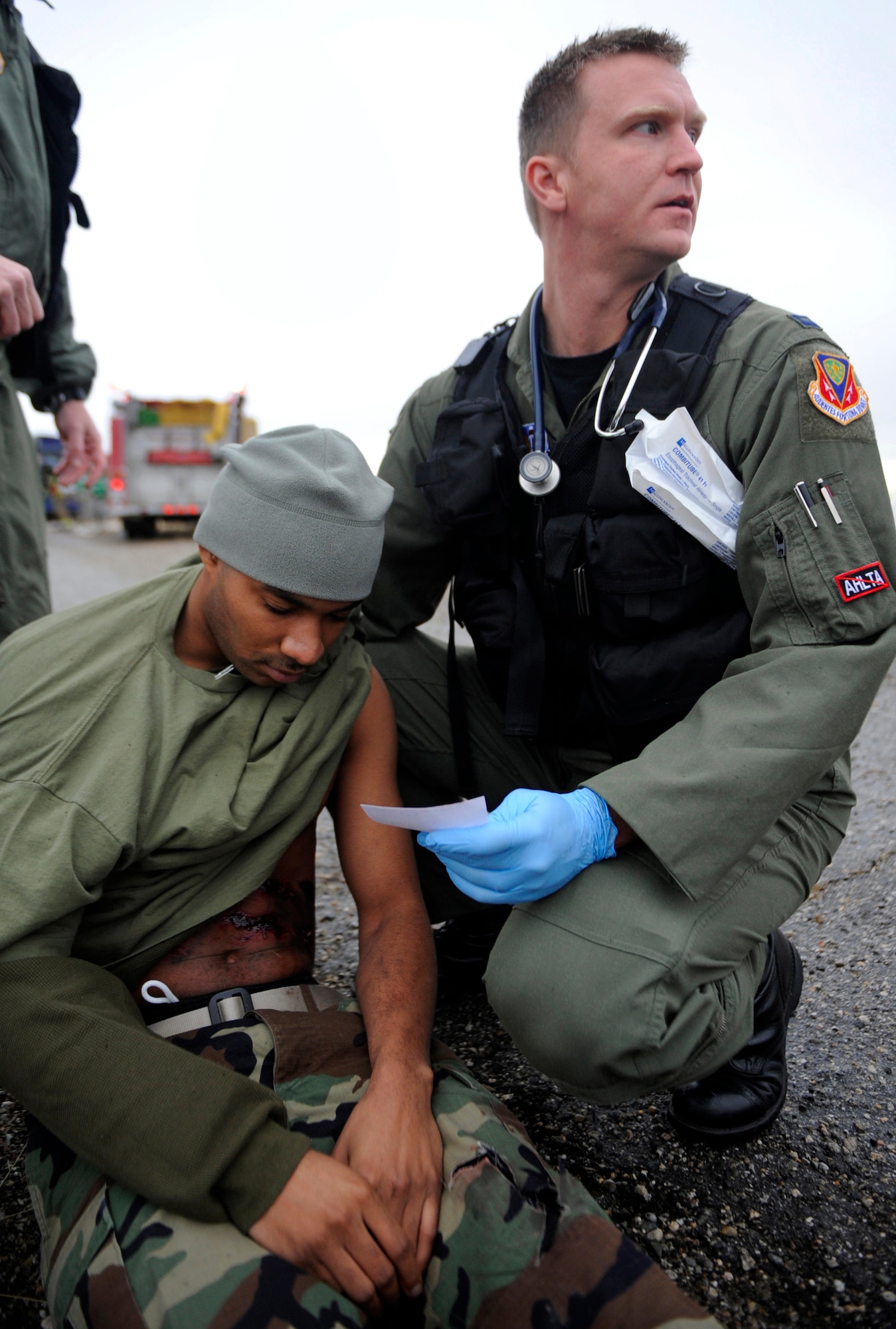 MOUNTAIN HOME AIR FORCE BASE, Idaho -- Capt. Noel Colls, 366th Aerospace Medical Squadron emergency response team, attends to a simulated injured patient during the Emergency Response Exercise Dec. 14. EREs are held to ensure Airmen are prepared to protect people and resources during real-world situations.  (U.S. Air Force photo by Senior Airman Renishia Richardson)