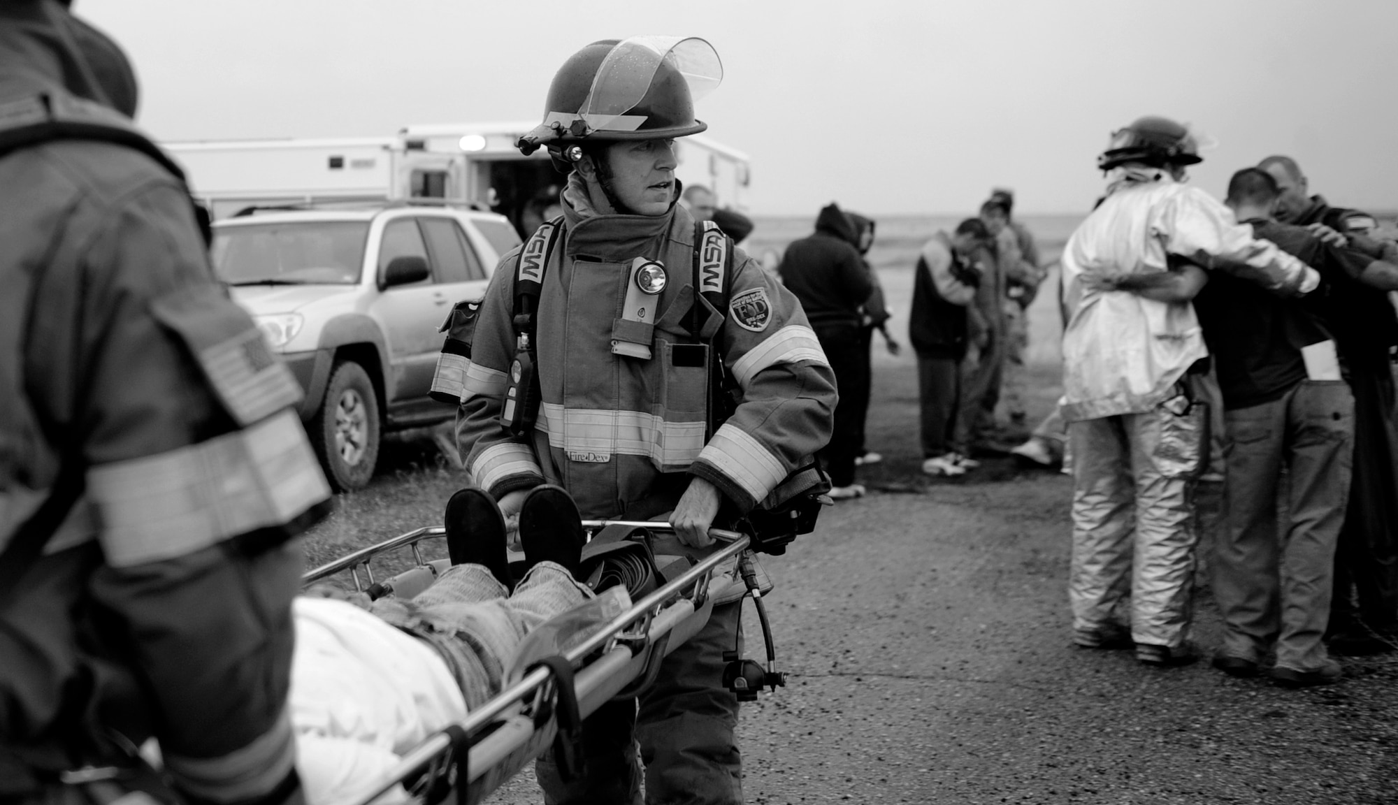 MOUNTAIN HOME AIR FORCE BASE, Idaho -- Firefighters from the 366th Civil Engineering Squadron respond to simulated wounded patients during the Emergency Response Exercise Dec. 14. EREs are held to ensure Airmen are prepared to protect people and resources during real-world situations.  (U.S. Air Force photo by Senior Airman Renishia Richardson)