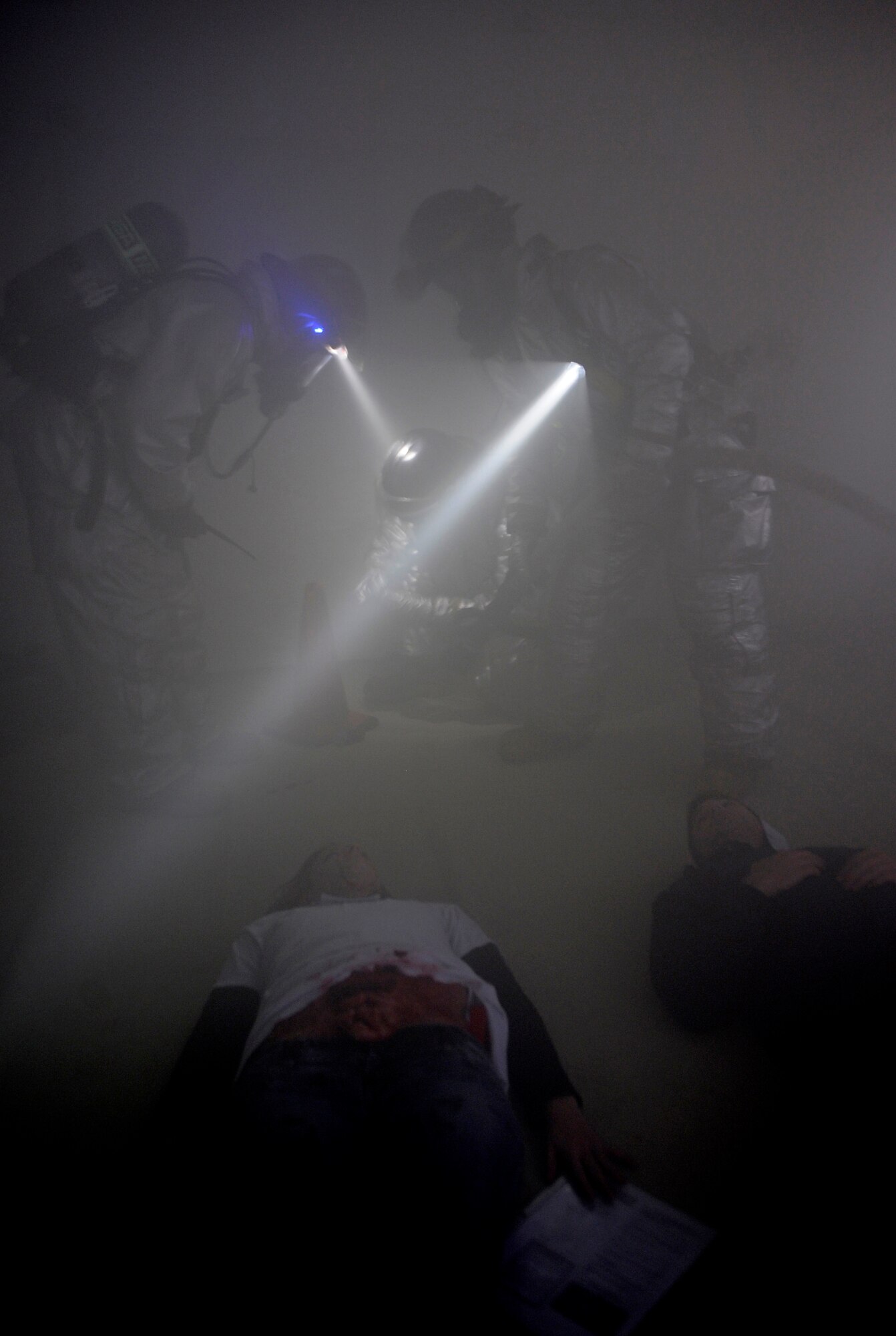 MOUNTAIN HOME AIR FORCE BASE, Idaho -- Firefighters from the 366th Civil Engineering Squadron respond to “wounded patients” during the Emergency Response Exercise Dec. 14. EREs are held to ensure Airmen are prepared to protect people and resources during real-world situations.  (U.S. Air Force photo by Senior Airman Renishia Richardson)