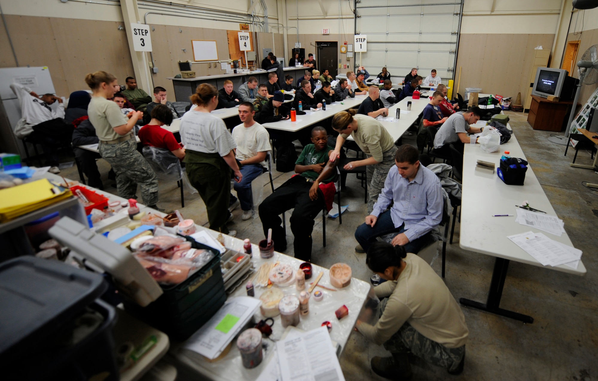 MOUNTAIN HOME AIR FORCE BASE, Idaho -- Airmen are made to resemble victims of an aircraft crash before the beginning of an Emergency Response Exercise here Dec. 14. EREs are held to ensure Airmen are prepared to protect people and resources during real-world situations.  (U.S. Air Force photo by Senior Airman Renishia Richardson)