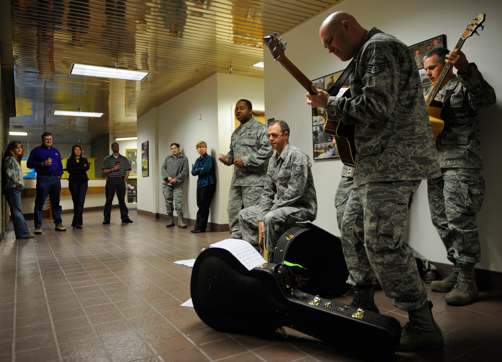 MOUNTAIN HOME AIR FORCE BASE, Idaho -- The Air Force Band of the Golden West performs for Fighter Wing staff members Dec. 16. The band traveled from Travis AFB, Calif., to perform Christmas songs throughout the wing. (U.S. Air Force photo by Senior Airman Renishia Richardson)