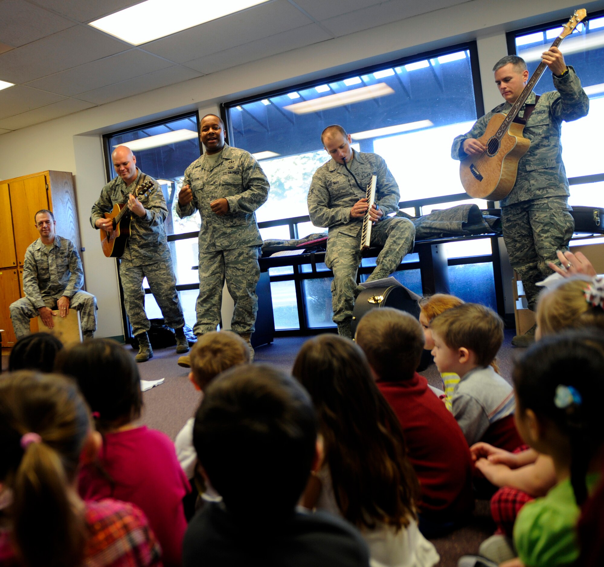 MOUNTAIN HOME AIR FORCE BASE, Idaho -- The Air Force Band of the Golden West performs at the child development center Dec. 16. The band traveled from Travis AFB, Calif., to perform Christmas songs throughout the wing. (U.S. Air Force photo by Senior Airman Renishia Richardson)