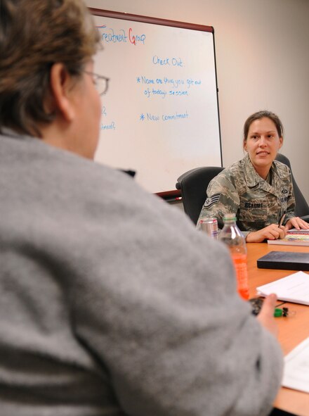 MOODY AIR FORCE BASE, Ga. -- Staff Sgt. Michelle Richards, 347th Operations Support Squadron aviation resource manager, asks Cynthia Henley, 23rd Medical Group family advocacy nurse, a question during the “1-2-3 Magic” parenting class Dec. 15. Mrs. Henley emphasized using a timer to give children a time limit to complete tasks. (U.S. Air Force photo/Airman 1st Class Douglas Ellis)(RELEASED)