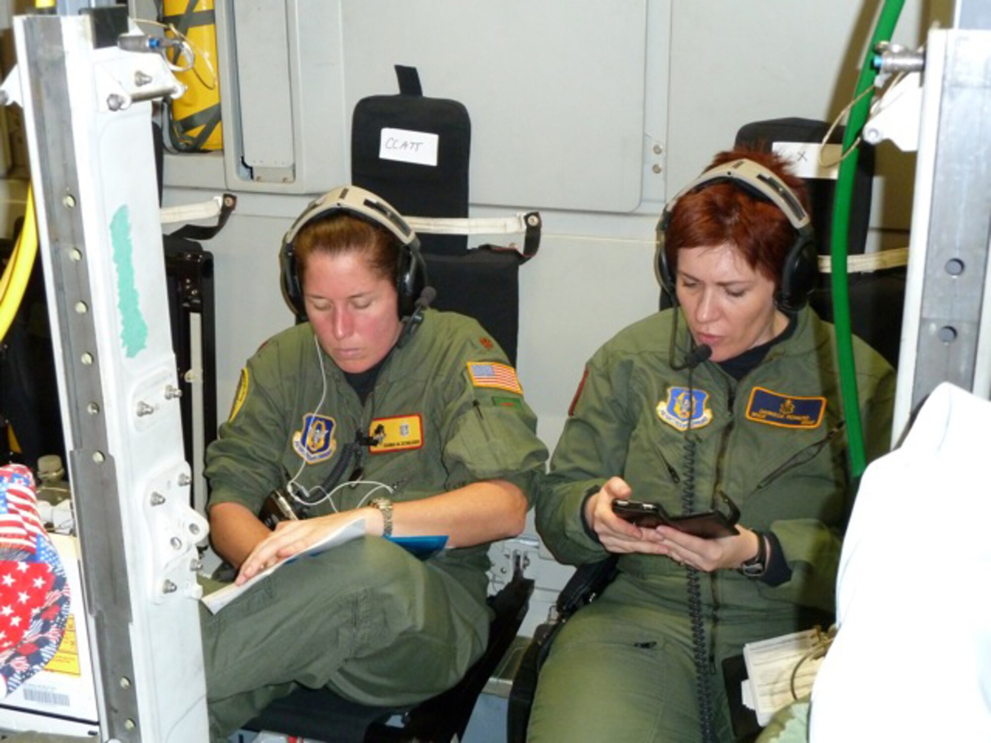 Critical Care Nurse, Maj. Dianna Schulckers from the 920th ASTS at Patrick AFB, Fla. and Respiratory Therapist Master Sgt. Danielle Romero from the 934th ASTS in Minneapolis during an aeromedical evacuation from Germany to the United States aboard a C-17. (Air Force Photo/315th Airlift Wing)
