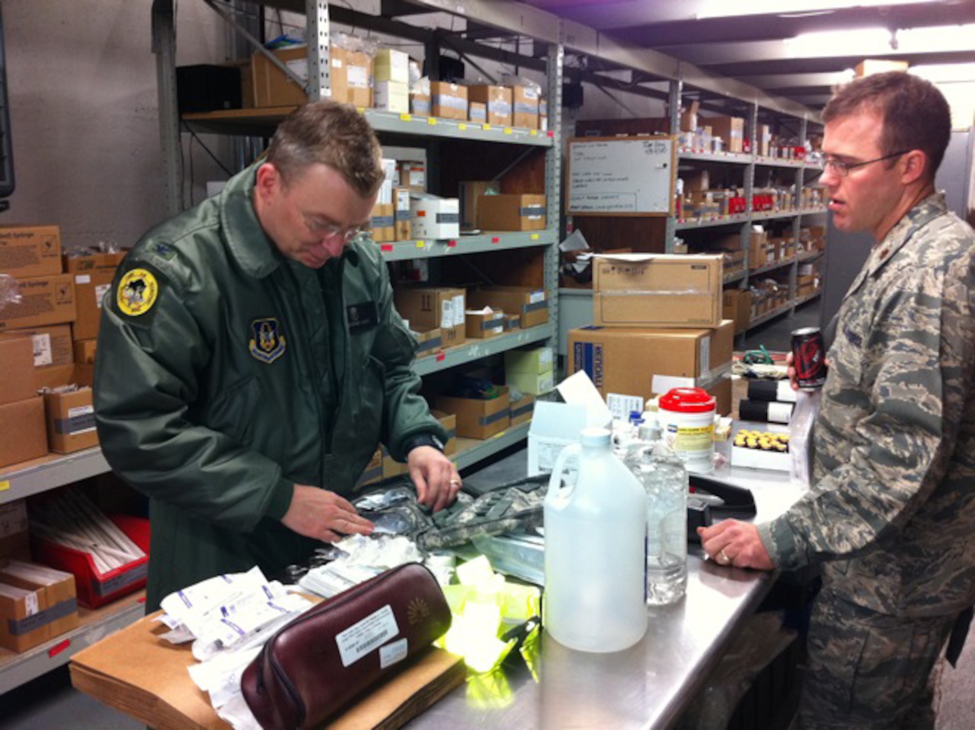 Col. Christopher W Lentz left, with Maj. Travis Gerlach (trauma surgeon and CCATT doctor from Cincinnatti C-STARS conduct a pre-mission planning at Ramstein Air Base. (Air Force Photo/315th Airlift Wing)
