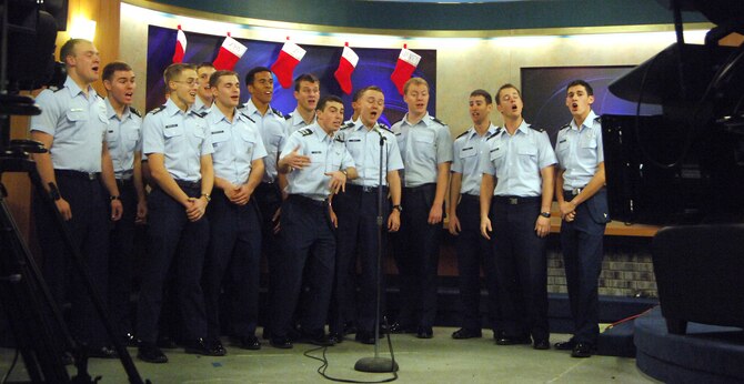 Air Force Academy cadets with the a cappella group "In the Stairwell" perform a medley of Christmas music live on KKTV Channels 5 and 30 in Colorado Springs, Colo., Dec. 10, 2010. The group performs for several events each year in the Colorado Springs and Denver areas. (U.S. Air Force photo/John Van Winkle)
