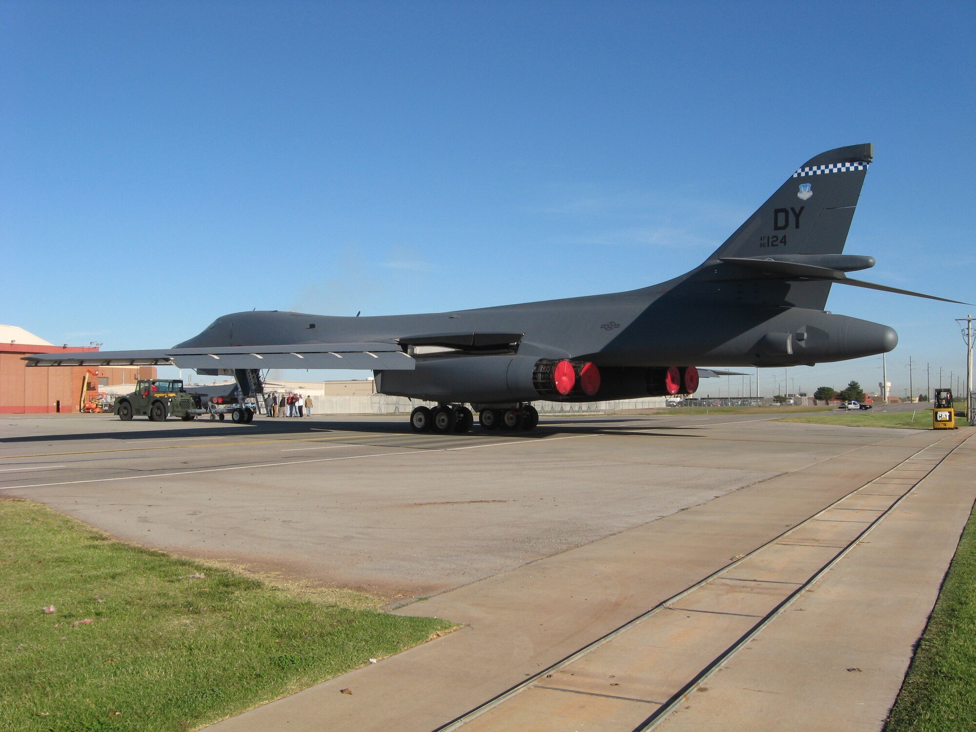 A B-1 aircraft is towed across Douglas Boulevard toward Tinker Air Force Base following maintenance work at the Boeing Maintenance, Repair and Overhaul Technology Center. (Photo courtesy of Boeing)