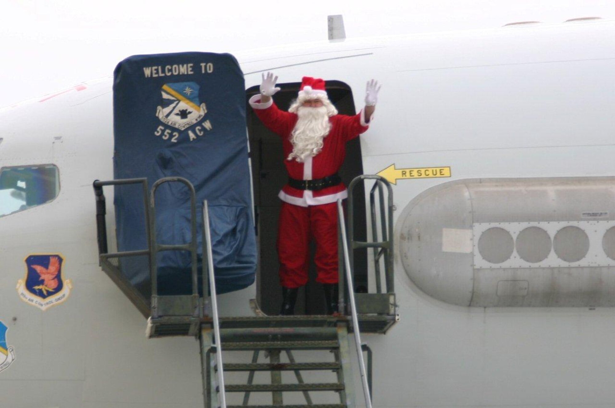 Santa Claus made a special appearance at Tinker Dec. 11. After flying in on an E-3 Sentry, the jolly old elf visited with the children of the 552nd Air Control Wing. (Air Force photo by Ken LaFayette)