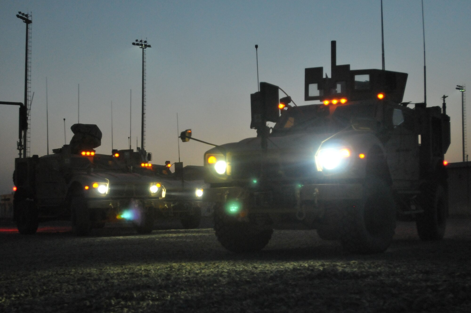 NATO Air Training Command-Afghanistan service members drive off in their MRAP-All Terrain Vehicles during an M-ATV course at the Afghan Air Force Base in Kabul, Afghanistan. (Photo by MC2 Vladimir Potapenko/Released)