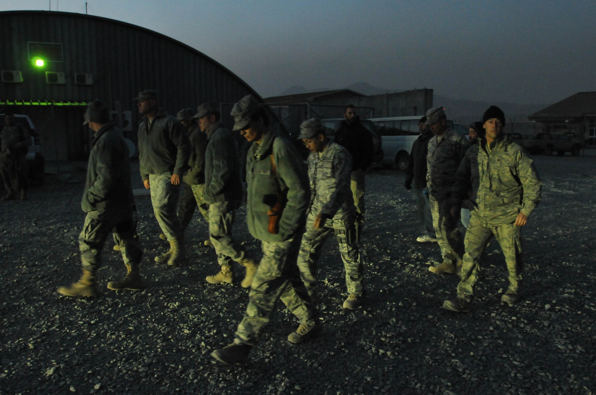 NATO Air Training Command-Afghanistan service members walk to their MRAP-All Terrain Vehicle during an M-ATV course at the Afghan Air Force Base in Kabul, Afghanistan. (Photo by MC2 Vladimir Potapenko/Released)