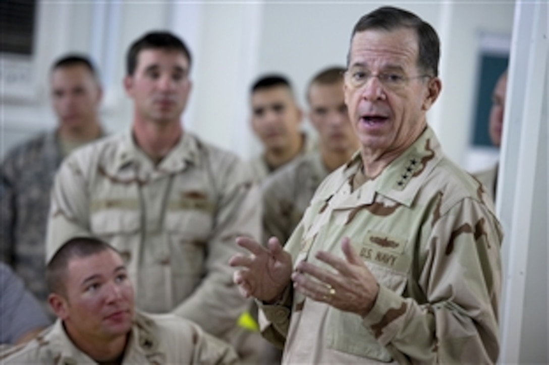 U.S. Navy Adm. Mike Mullen, chairman of the Joint Chiefs of Staff, addresses U.S Navy sailors in Bahrain, Dec.17, 2010. Mullen and his wife, Deborah, stopped to visit troops in the Persian Gulf nation during the USO holiday tour.