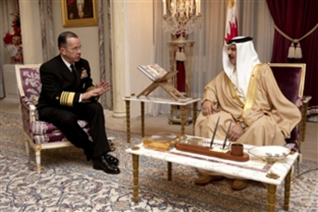 U.S. Navy Adm. Mike Mullen, chairman of the Joint Chiefs of Staff, meets with his majesty Hamad ibn Isa Al Khalifa, King of Bahrain, in Manama, Bahrain, Dec.17, 2010. Mullen and his wife, Deborah, are traveling with the USO holiday tour while also meeting with foreign dignataries and U.S. troops.