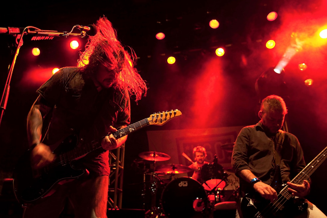 Wind-up Records rock band Seether shreds a song for a crowd of Marines, sailors and their families during a concert on Marine Corps Base Hawaii, Dec. 17, 2010. “There’s nothing like a bunch of fired-up Marines,” said Shaun Morgan, Seether’s frontman. “What you guys do is a selfless service, so the least we can do is come out here and honor you.” At the end of the free concert, sponsored by the United Service Organizations, Morgan gave a “shout-out” to Marines and sailors from 3rd Battalion, 3rd Marine Regiment, who recently returned from a seven-month deployment to Afghanistan in support of Operation Enduring Freedom. “Welcome back, guys,” he said.