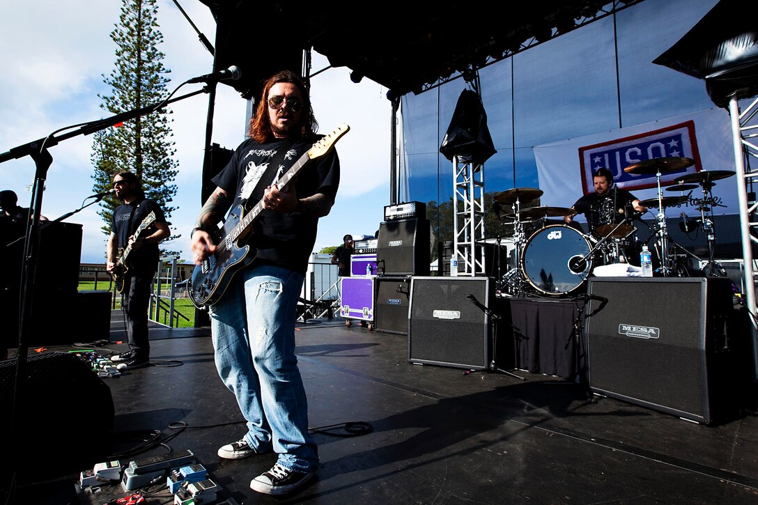 Wind-up Records rock band Seether performs a sound check prior to a concert on Marine Corps Base Hawaii, Dec. 17, 2010. “There’s nothing like a bunch of fired-up Marines,” said Shaun Morgan, Seether’s frontman. “What you guys do is a selfless service, so the least we can do is come out here and honor you.” At the end of the free concert, sponsored by the United Service Organizations, Morgan gave a “shout-out” to Marines and sailors from 3rd Battalion, 3rd Marine Regiment, who recently returned from a seven-month deployment to Afghanistan in support of Operation Enduring Freedom. “Welcome back, guys,” he said.