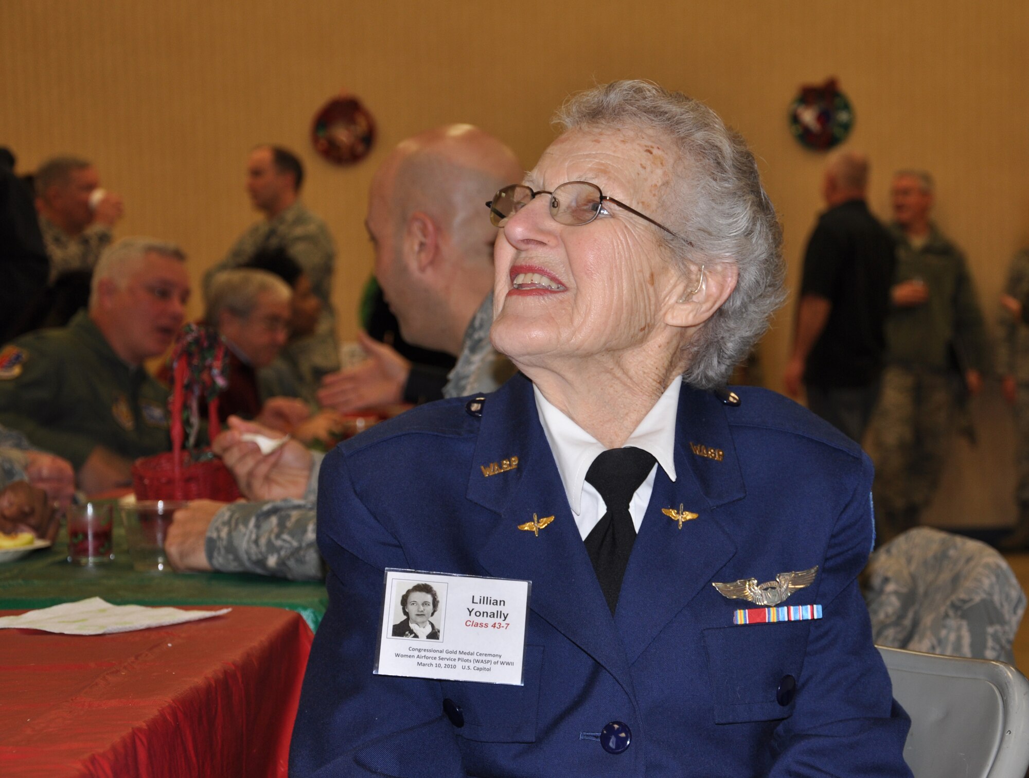 JOINT BASE MCGUIRE-DIX-LAKEHURST, N.J. -- Mrs. Lillian Yonally, a World War II Women Airforce Service Pilot attends the 514th Air Mobility Wing 22nd Annual Holiday Breakfast held Dec. 16, here. Other guests in attendance were Congressman-elect Jon Runyan and fellow WWII veteran George Watson, a documented Tuskegee Airmen. (U.S. Air Force photo/Master Sgt. Travon W. Dennis)