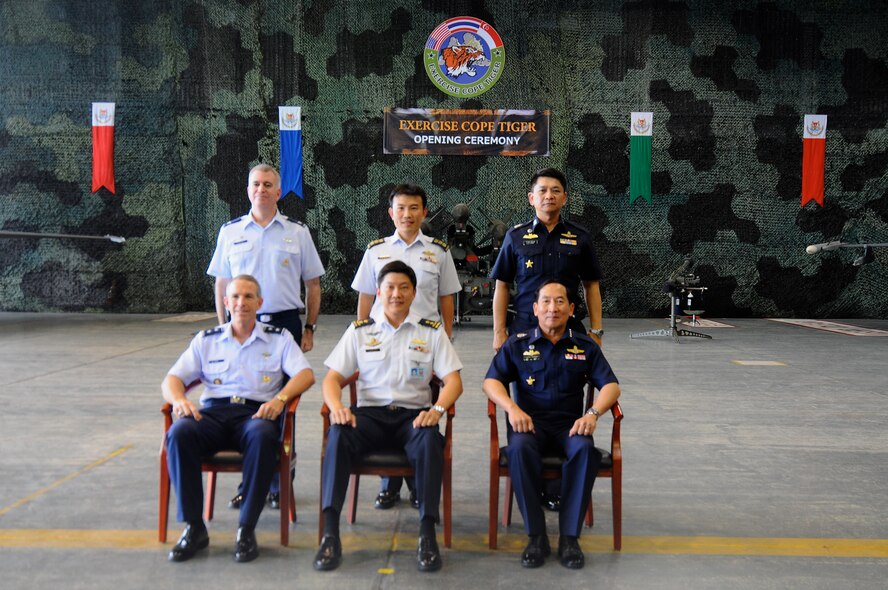 Air chiefs and exercise Cope Tiger directors from the United States, Singapore, and Thailand pose for a photo during the exercise Cope Tiger 2011 opening ceremony at Paya Lebar Air Base, Singapore, on Dec. 13, 2010. Cope Tiger is an annual, multilateral aerial large force exercise conducted in the Asia-Pacific region. (Courtesy photo) 