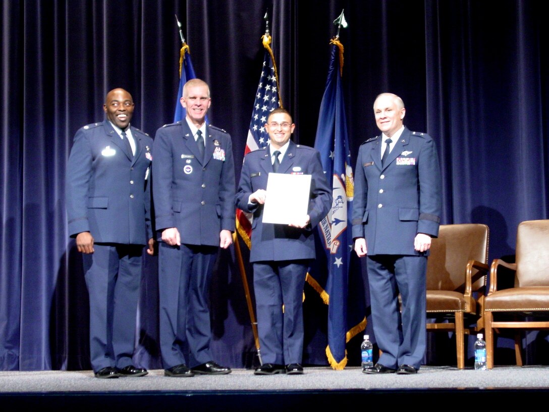 Maxwell AFB, AL: 2nd Lieutenant Steven Ortiz graduated from the Academy of Military Science on Friday, 17 December 2010.  Lieutenant. Ortiz is pictured with Lieutenant Colonel Ronald Daniels, Commander of the Academy of Military Science, Colonel Timothy O'Brien, Commander of the Officer Training School, and Brigadier General John McGoff, Chief of Staff, Indiana Air National Guard.  General McGoff administered the Oath of Office to the 113 graduates of AMS Class 0-2011-2.