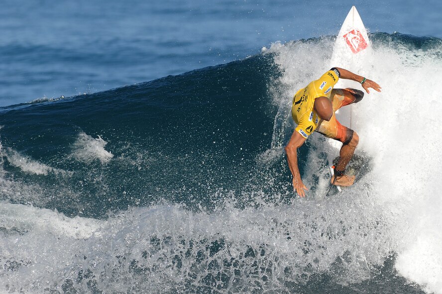 Kelly Slater, 10-time Association of Surfing Professionals World Surfing Champion, carves up Pipeline at Sunset Beach on the North Shore of Oahu, Hawaii, during the final heats of the Billabong Pipe Masters , In memory of Andy Irons, Dec. 16. The culminating event of the Triple Crown of Surfing series is the longest running professional surfing event in the world. Slater, Cocao Beach, Fla., lost to over all winner Jeremy Flores, of France, by .27 points, scoring 17.23 on his two strongest rides of the semi-final heat. (U.S. Air Force photo/Staff Sgt. Mike Meares)