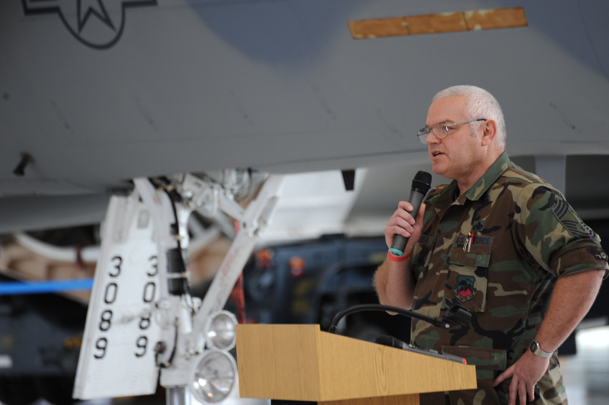 Command Chief Master Sgt. John Rasmussen spoke on the maintenance aspect of the Oregon Air Guard having one of the original production F-15A. Aircraft 73-089 was dedicated to the Evergreen Aviation Museum Nov 11, 2010. 73-089 was the oldest flying F-15 Eagle retiring at thirty six years of service. One of the first production aircraft, 089 had a uniqueness that both the maintenance and pilots loved. (US Air Force Photograph by Tech. Sgt. Greg Neuleib)