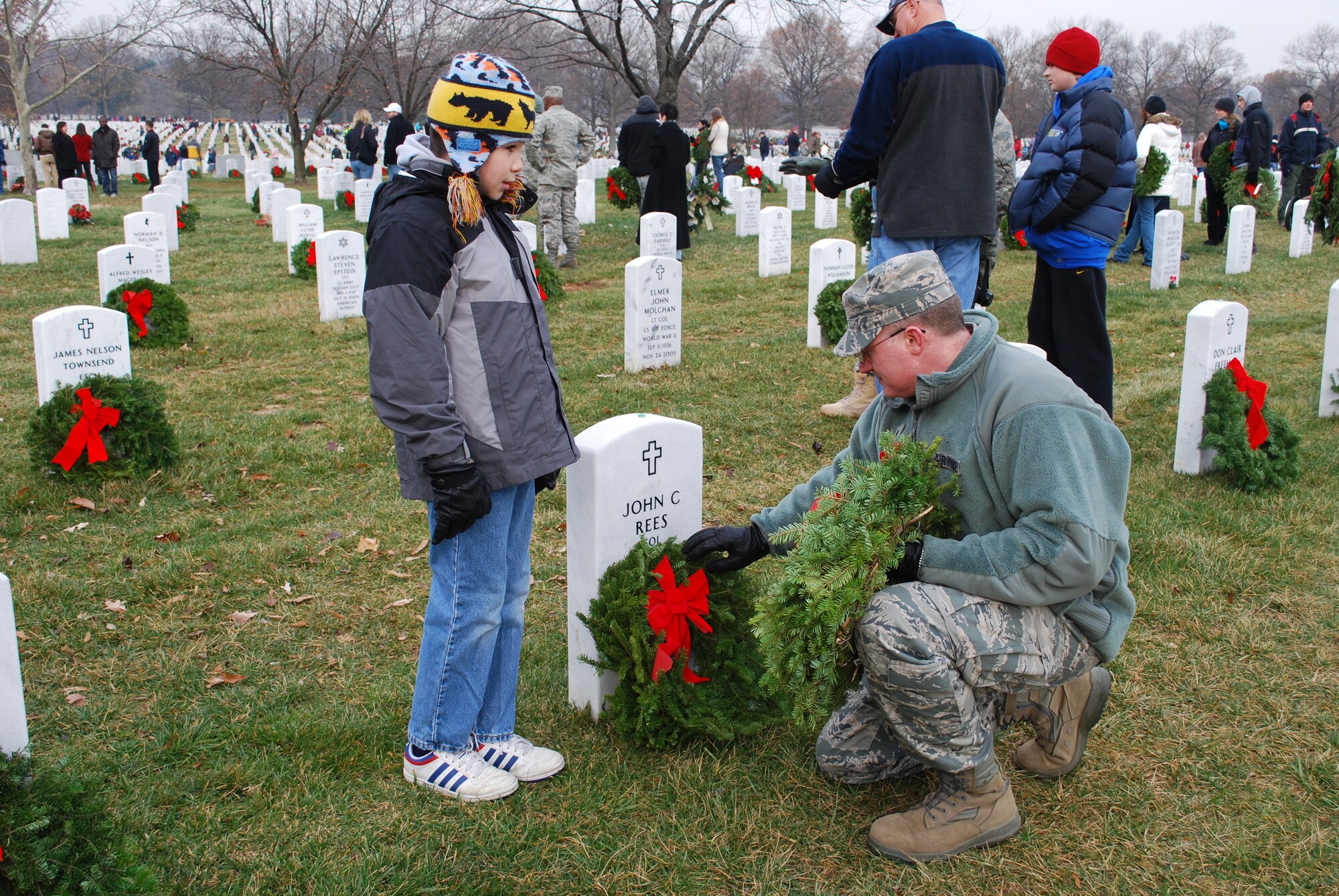 JOINT BASE MCGUIRE-DIX-LAKEHURST, N.J. -- Members of the 514th Air Mobility Wing participate in the annual Wreaths Across America event held Dec. 11 at Arlington National Cemetery located in Arlington, Va. Volunteers placed wreaths on the headstones of fallen military veterans in honor of their memory. (U.S. Air Force photo/Senior Master Sgt. Chryl Ruff)