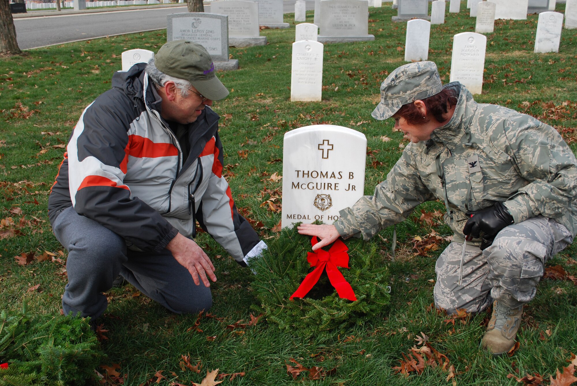 JOINT BASE MCGUIRE-DIX-LAKEHURST, N.J. -- Members of the 514th Air Mobility Wing made a special visit to the gravesite of Joint Base McGuire-Dix-Lakehurst's namesake, World War II Ace, Major Thomas B. McGuire Dec. 11, as part of their trip to Arlington National Cemetery, Arlington, Va., to participate in the annual Wreaths Across America event. (U.S. Air Force photo/Master Sgt. Chryl Ruff)