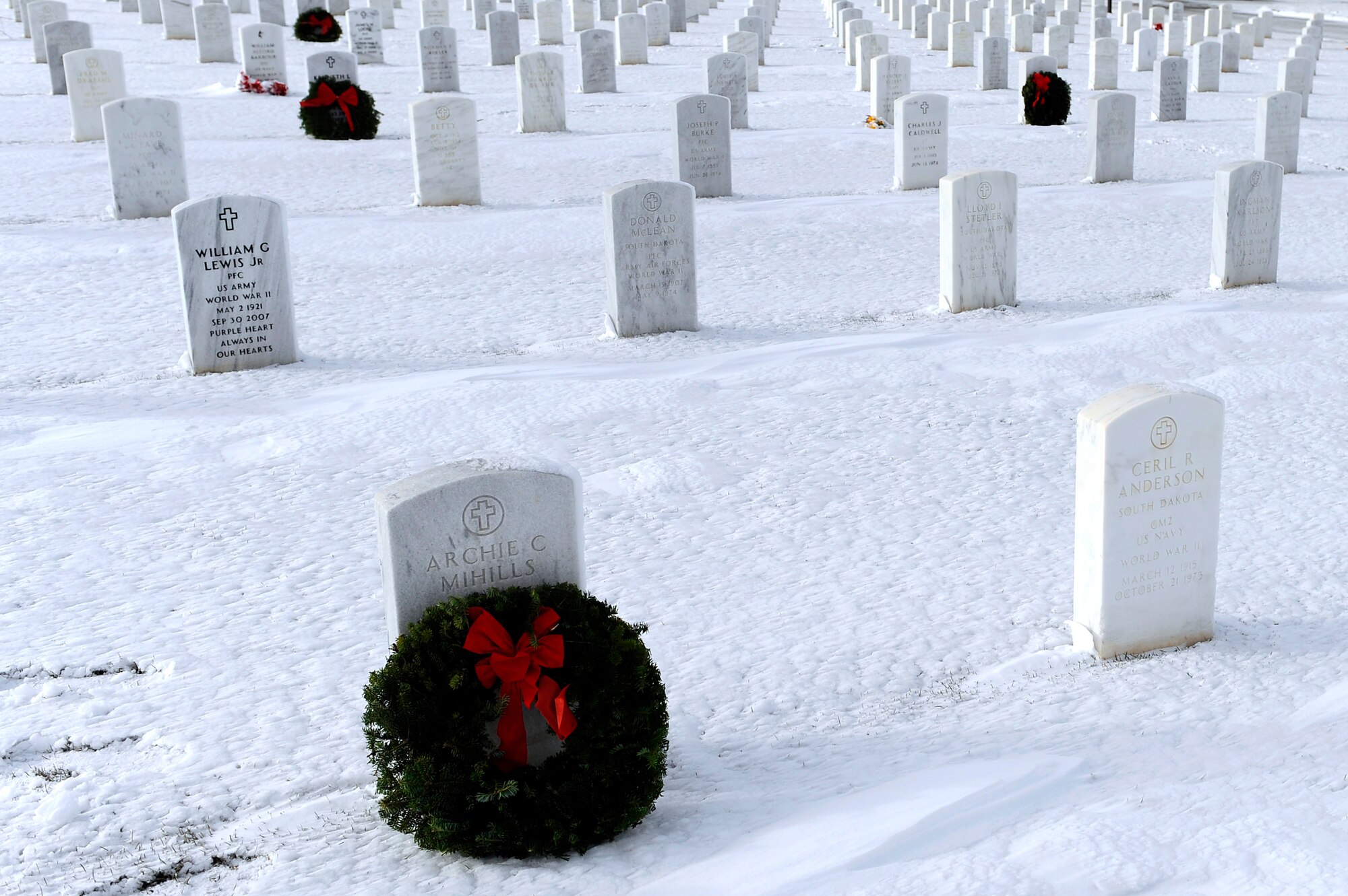 Approximately 250 wreaths honor the graves of veterans at the Black Hills National Cemetery, S.D., Dec. 11.  More than 50 Airmen from Ellsworth Air Force Base, S.D., volunteered to lay wreaths on the graves during the 2010 Wreaths Across America ceremony, held annually on the second Saturday of December in honor of veterans who have passed. (U.S. Air Force photo/Staff Sgt. Marc I. Lane)