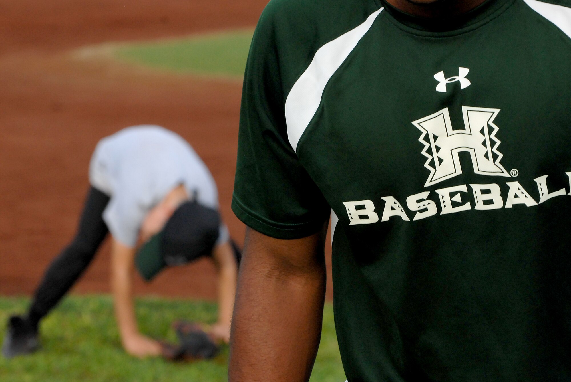Hickam and Pearl Harbor children were taught baseball fundamentals by University of Hawaii and Hawaii Pacific University coaches and players duringthe event. The baseball clinic is the first of an annually planned event for the Friends of Hickam. (U.S. Air Force photo/Staff Sgt. Mike Meares)