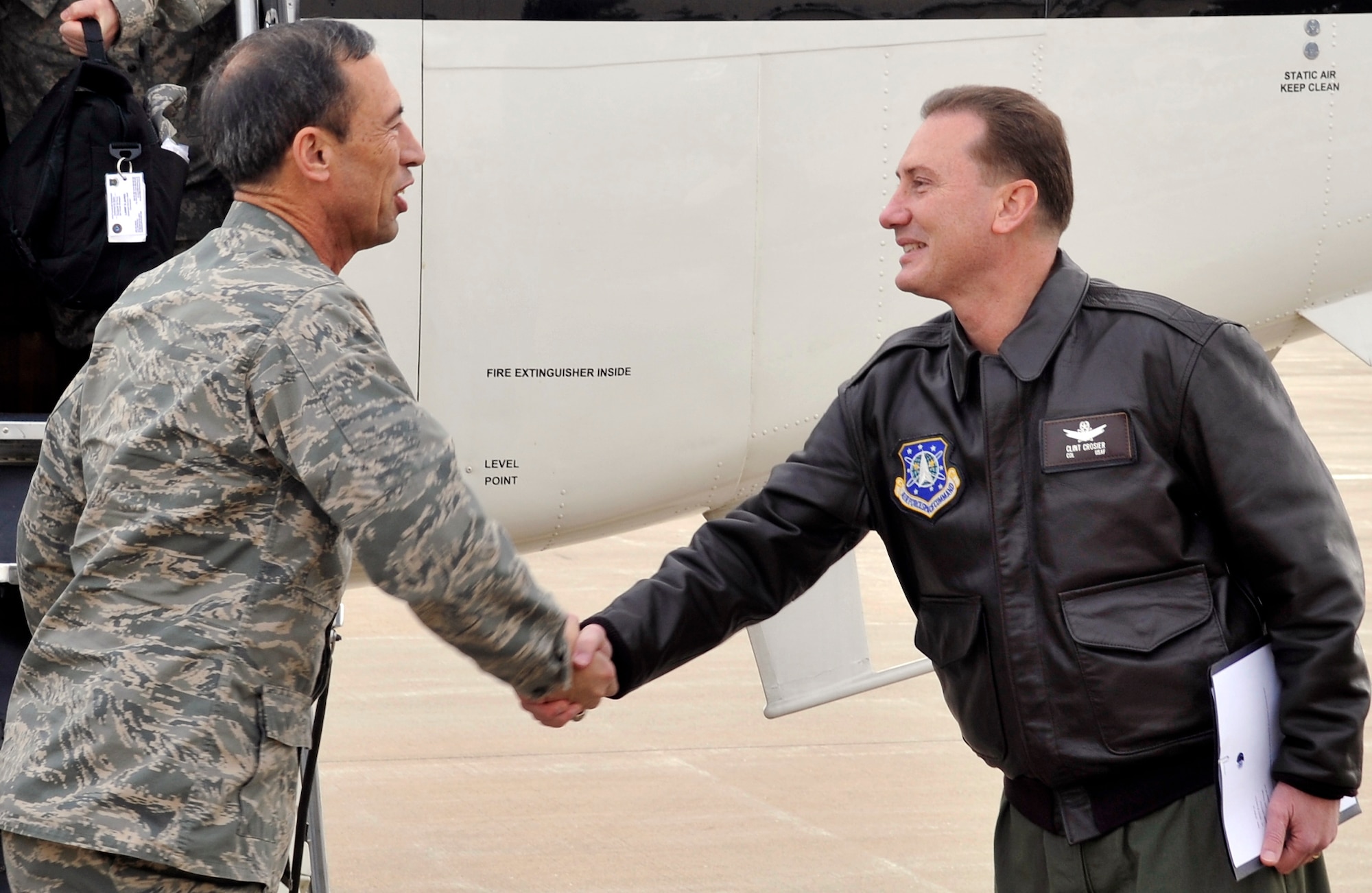 BUCKLEY AIR FORCE BASE, Colo. -- Col. Clint Crosier, 460th Space Wing commander, welcomes Lt. Gen. Larry D. James, 14th Air Force commaner to Buckley. General James visited the base in an effort to thank all the Airmen for their work during his tenure. (U.S. Air Force photo by Airman 1st Class Paul Labbe.)
