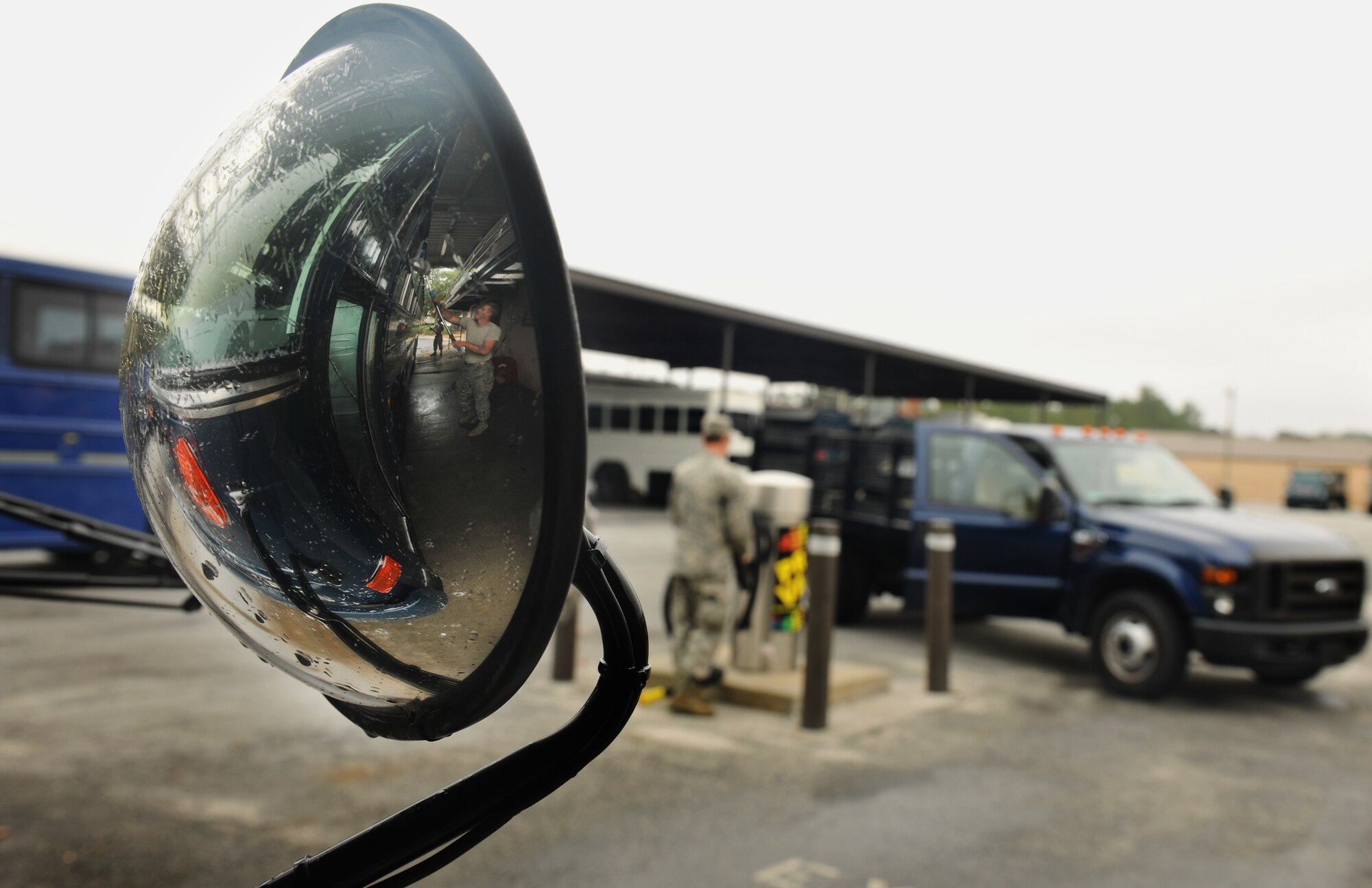 MOODY AIR FORCE BASE, Ga.-- Airman 1st Class Spencer Kling, 23rd Logistics Readiness Squadron vehicle operations flight journeyman, recently washes a bus that was used in a recent operational readiness exercise. Airmen Kling was tasked with cleaning the inside and outside of several buses as well inspecting for any damage. (U.S. Air Force photo/Airman 1st Class Joshua Green)(RELEASED)
