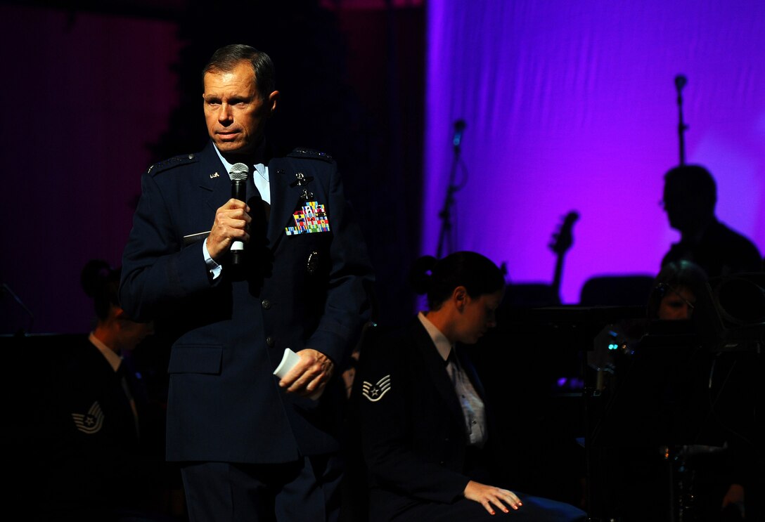 General Fraser, Commander, Air Combat Command, welcomes the Omaha community to the USAF Heartland of America Band's annual holiday concert series held at the Holland Performing Arts Center.