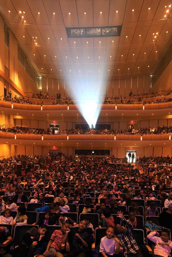 Children from the Omaha metro area await the beginning of the USAF Heartland of America Band's holiday show performance.  The band did two children shows at the Holland Performing Arts Center.