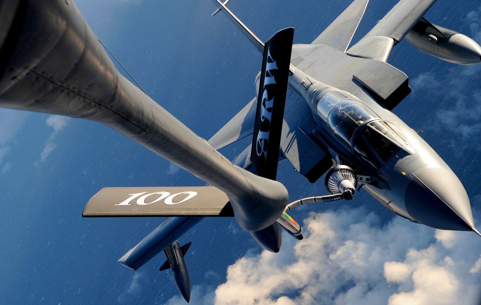 RAF MILDENHALL, England -- An RAF Tornado from RAF Lossiemouth, Scotland, takes gas from a 100th Air Refueling Wing KC-135 Stratotanker Dec. 16, 2010. The Tornado was one of four that were refueled during a training mission to ensure that the pilots are up to date on their requirements. (U.S. Air Force photo/Senior Airman Ethan Morgan)