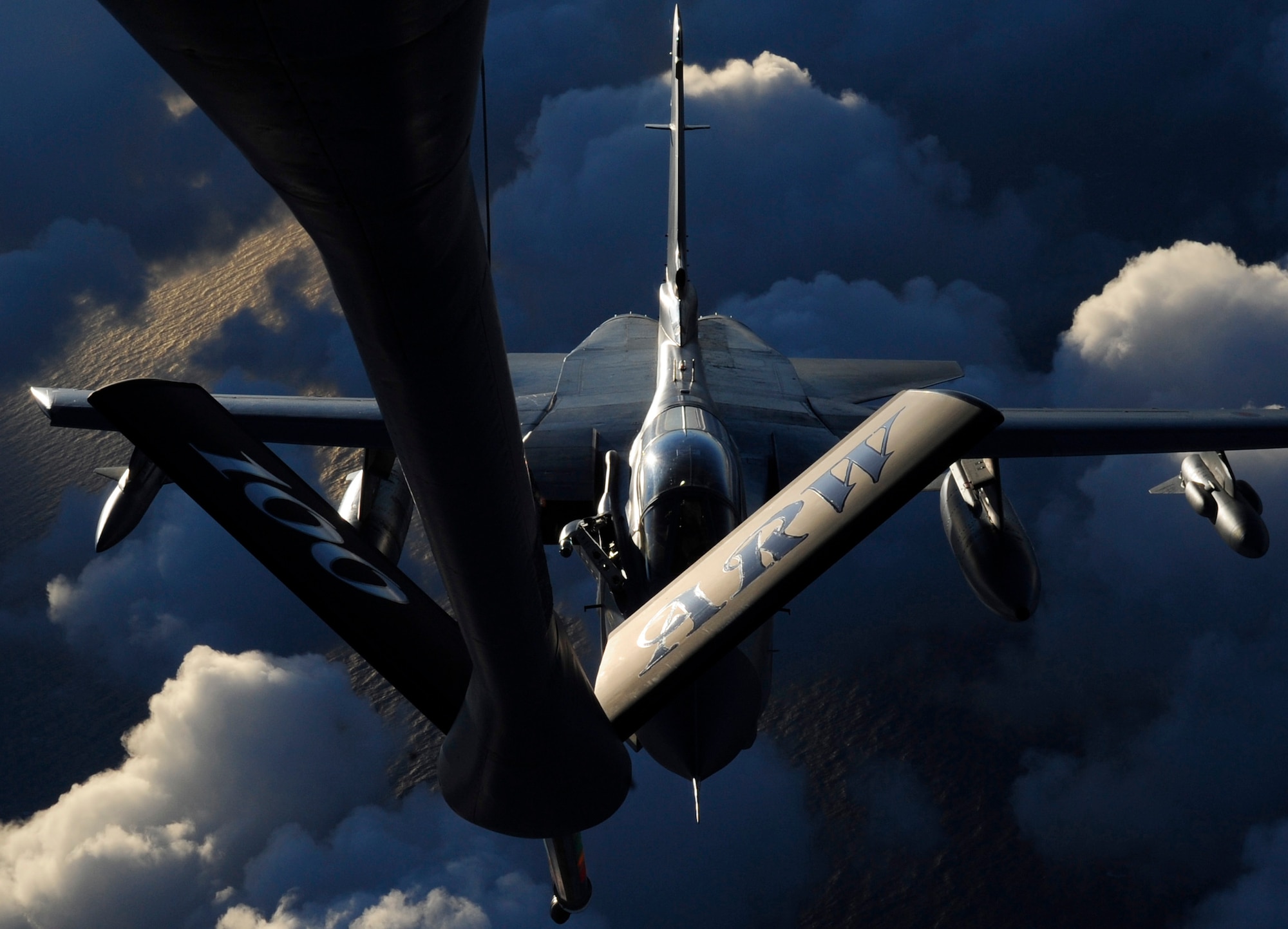 RAF MILDENHALL, England -- An RAF Tornado from RAF Lossiemouth, Scotland, takes gas from a 100th Air Refueling Wing KC-135 Stratotanker Dec. 16, 2010. The Tornado was refueled as part of a training mission in preparation of an upcoming deployment. (U.S. Air Force photo/Senior Airman Ethan Morgan)