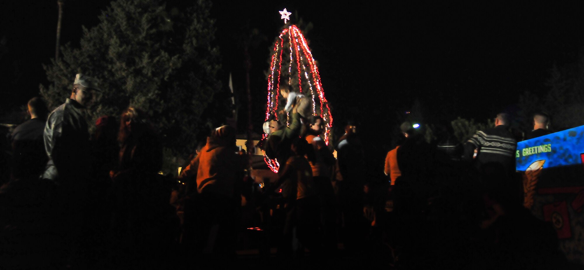 Incirlik members gathered at the base chapel for the tree lighting ceremony Dec. 3, 2010 at the base chapel. The ceremony is held every year during the holiday season to bring Airmen and their families together by lighting the base holiday tree. (U.S Air Force Photo by Staff Sergeant Alexandre Montes/Released)
