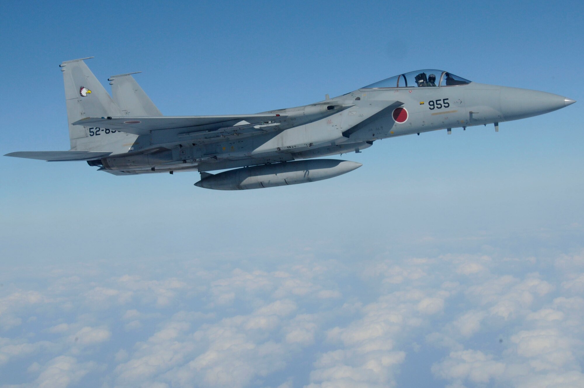 An F-15J flies through the air during the joint refueling training between the 909th Refueling Squadron and Japan Air Self Defense Forces, Dec. 17. This training improved bilateral relationships between the 18th Wing and JASDF members. (U.S. Air Force photo/Staff Sgt. Darnell T. Cannady)