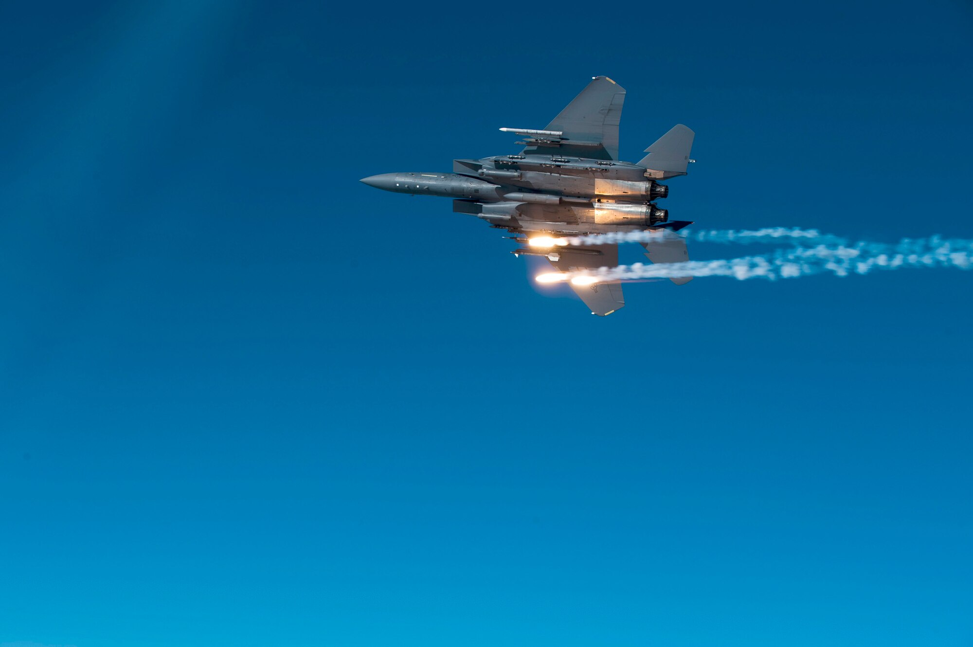 Flares are released from an F-15E Strike Eagle during a local training mission Dec. 17, 2010, over North Carolina. The F-15E is from the 335th Fighter Squadron from Seymour Johnson Air Force Base, N.C. (U.S. Air Force photo/Staff Sgt. Michael B. Keller)
