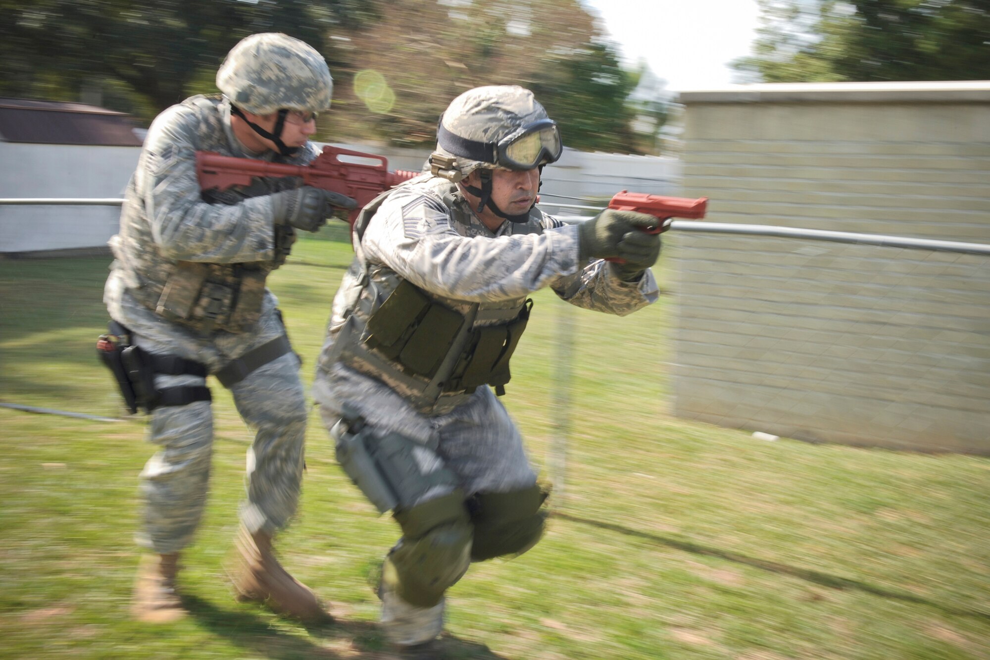 Chief Master Sgt. Joseph Pritchard and Staff Sgt. Michael Grosso perform tactical team movements during active shooter training Oct. 28, 2010, at Moody Air Force Base, Ga. Chief Pritchard believes it is important to give younger Airmen the necessary tools to keep the mission going because they are the future of the Air Force. Chief Pritchard is the 3rd Security Forces Squadron security forces manager. Sergeant Grosso is a patrol leader with the 23rd. (U.S. Air Force photo/Senior Airman Jamal D. Sutter)