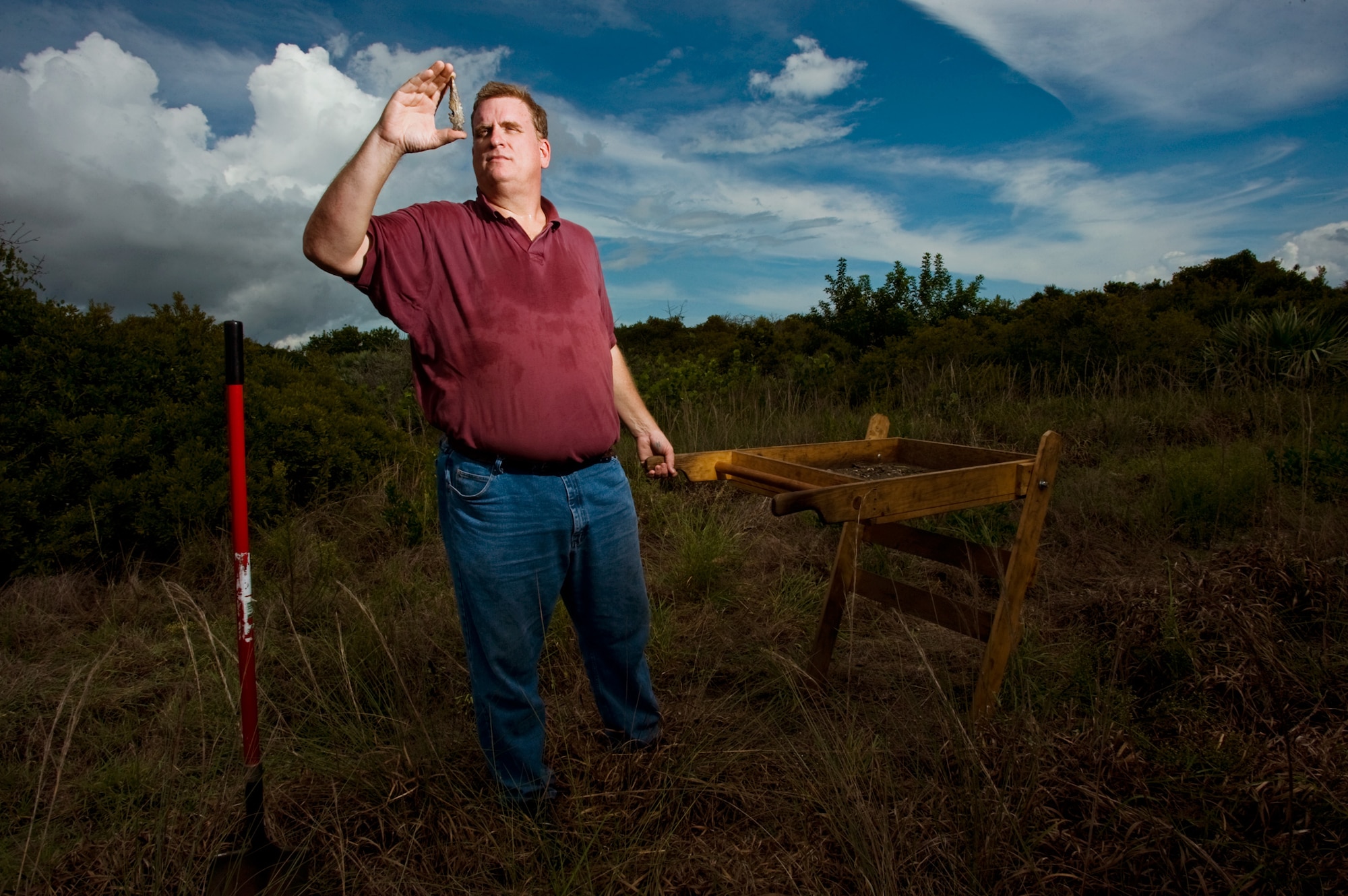Mr. Thomas Penders, an aerospace archaeologists, holds a 7,500 year-old stone arrow artifact found on Cape Canaveral Air Force Station near a archeological site named Sarah about a mile off the beach on base. Mr. Penders is the cultural resource manager for the U.S. Air Force 45th Space Wing's Civil Engineering Squadron, Cape Canaveral Air Force Station. (U.S. Air Force photo/Tech. Sgt. Bennie J. Davis III)