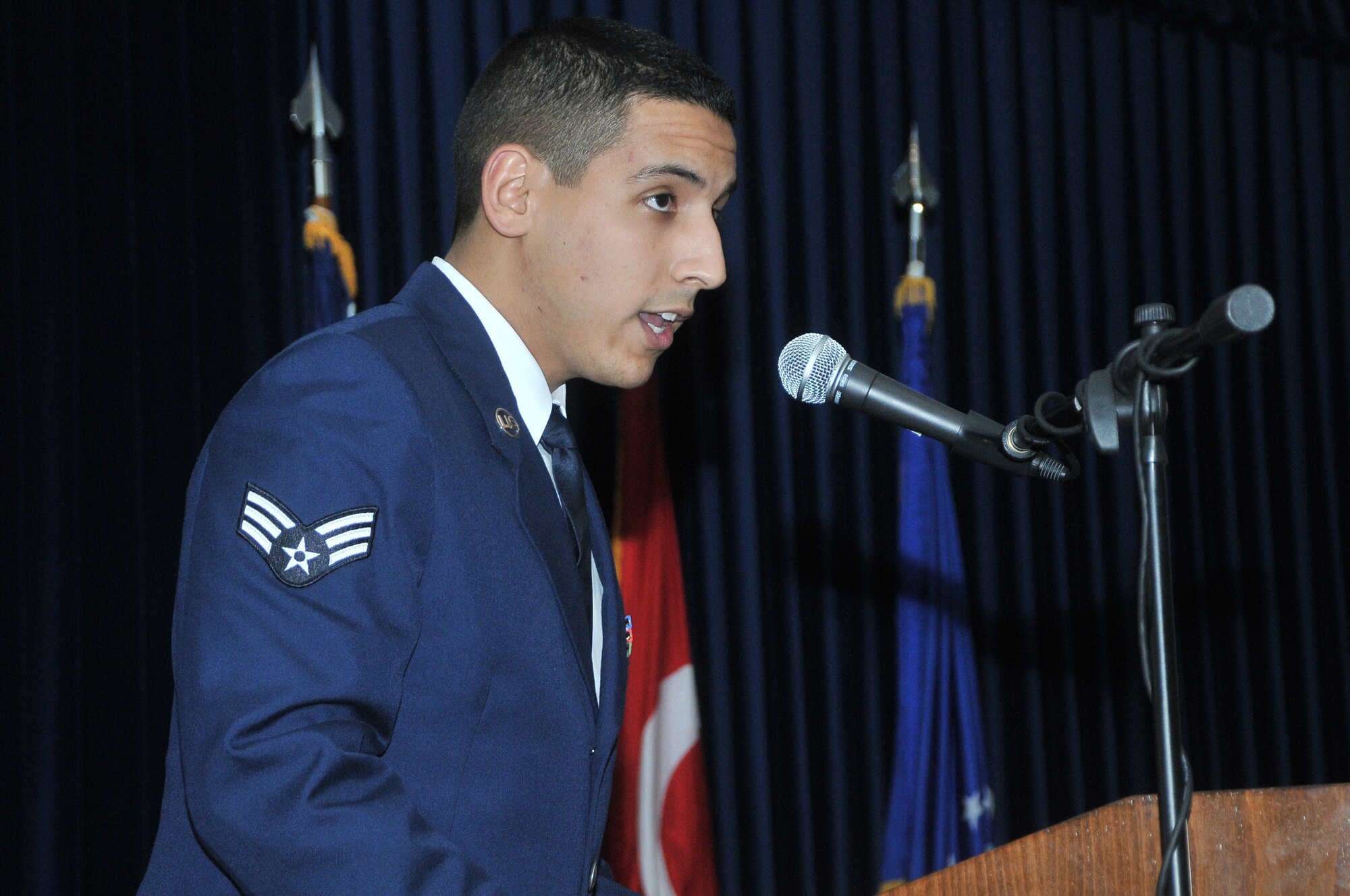 Senior Airman James Owens, of the 39th Maintenance Squadron, gives his class final thoughts during the Airman Leadership School graduation for class 11-2 at the consolidated club Dec. 3, 2010 at Incirlik Air Base, Turkey. The graduates of class 11-2 were Senior Airmen Berlin Aniciete, Antonia De La Cruz, Todd Graham, Christopher Kosel, and Matthew London, from the 39th Logistics Readiness Squadron;  Senior Airmen Darrell Bowers, Jake Harris, and Trenton Johnson,  from the 39th Security Forces Squadron; Senior Airmen Stanley Graham and Roshaun Williams from the 39th Communications Squadron;  Senior Airman James Owens of the 39th Maintenance Squadron;  Senior Airman Jordan Herrera and Staff Sgt. Matthew Miller, of the 39th Medical Support Squadron;  Senior Airman Zachery LeMaster, from the 39th Maintenance Group;  Senior Airman Ashley Wood, of 39th Air Base Wing; and Staff Sgt. Jermaine Walton, from the 39th Comptroller Squadron. (U.S. Air Force photo by Staff Sgt. Alex Montes)