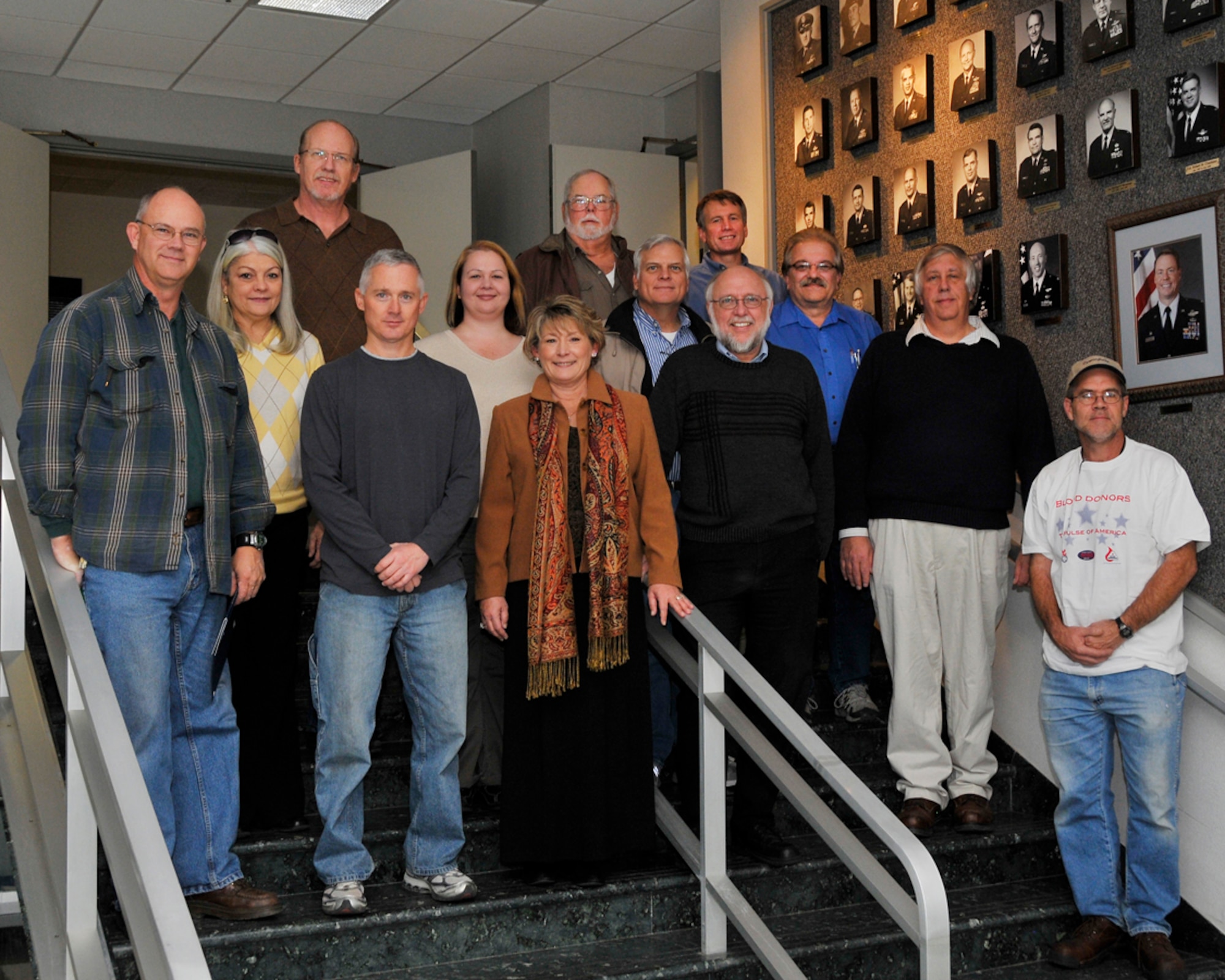 On Dec. 13, 2010, Dr. Ralph Jones, branch manager of Aerospace Testing Alliance's (ATA) Technology Analysis Branch (not pictured) presented the following AEDC employees with a NASA Group Achievement Award (from left); back row, Gary Storey, Larry Standford and Terry Hand; middle row, Becky Combs, Katie Stephens, Bob Boswell and Danny Catalano; and front row, Roy Carroll, Brad Besheres, Jennifer Harvey, Dr. Robert Howard, Brad Winkleman and Steven Lepley. (Photo by Rick Goodfriend) 