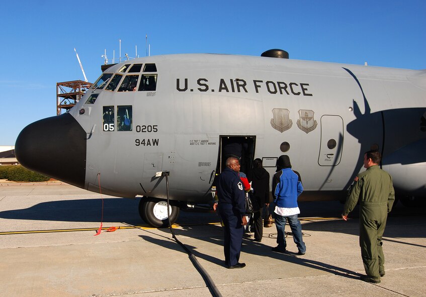 Georgia area foster kids got a chance to board and ride around the base in a C-130H2 from the 94th Airlift Wing at Dobbins Air Reserve Base, Ga., Dec. 20.  Operation Santa Lift Tour provided a half day visit for area foster kids to get a behind-the-scenes look at base operations.  (U.S. Air Force photo/ Brad Fallin)