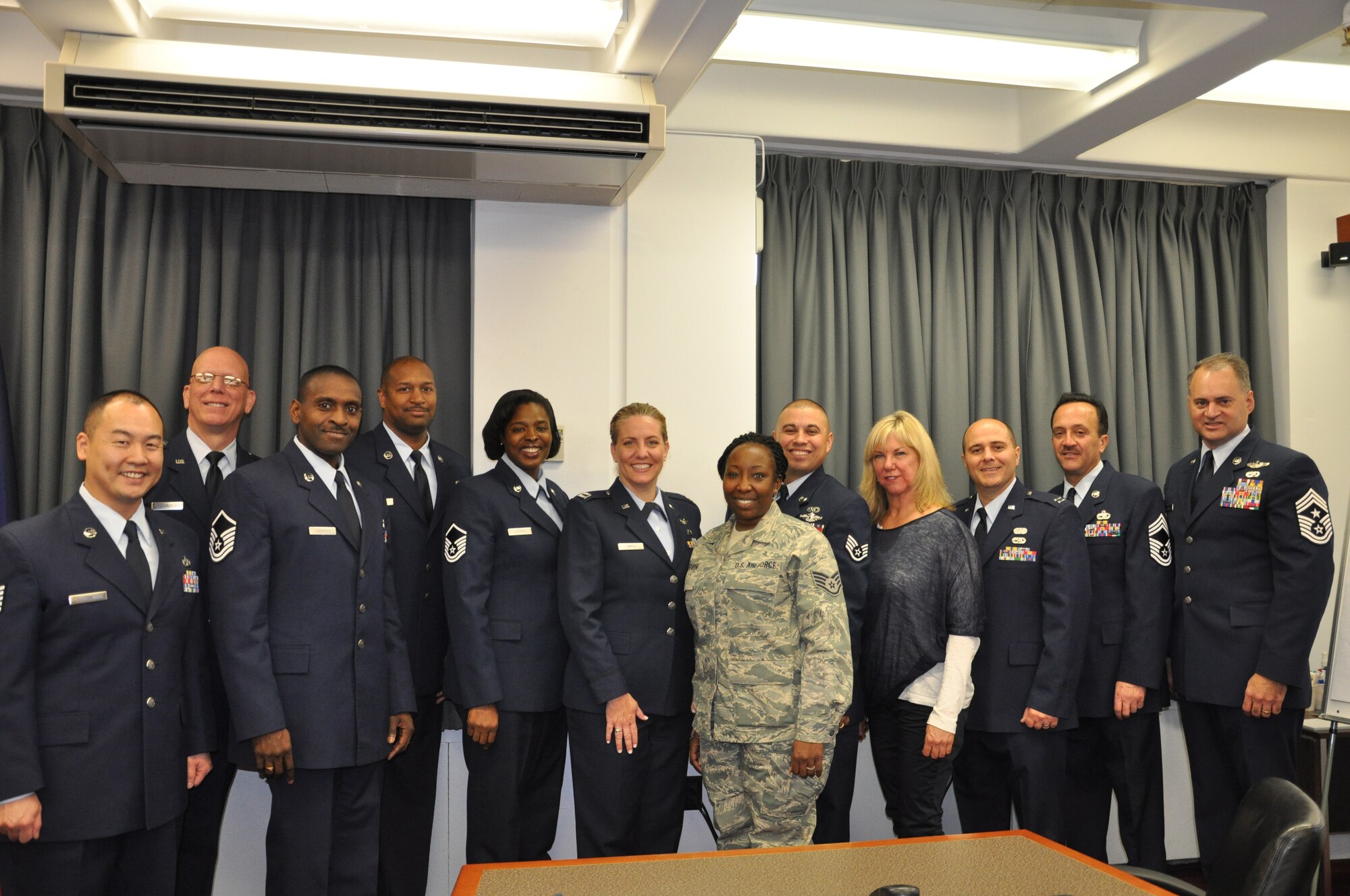 JOINT BASE MCGUIRE-DIX-LAKEHURST, N.J. -- Twelve members of the 514th Air Mobility Wing, here, meet New York City Police Commissioner Raymond W. Kelly Dec. 13 during their Reserve employer outreach trip to the New York Police Department Headquarters, New York, NY. Six of the members shown are NYPD officers in their civilian life. (U.S. Air Force photo)