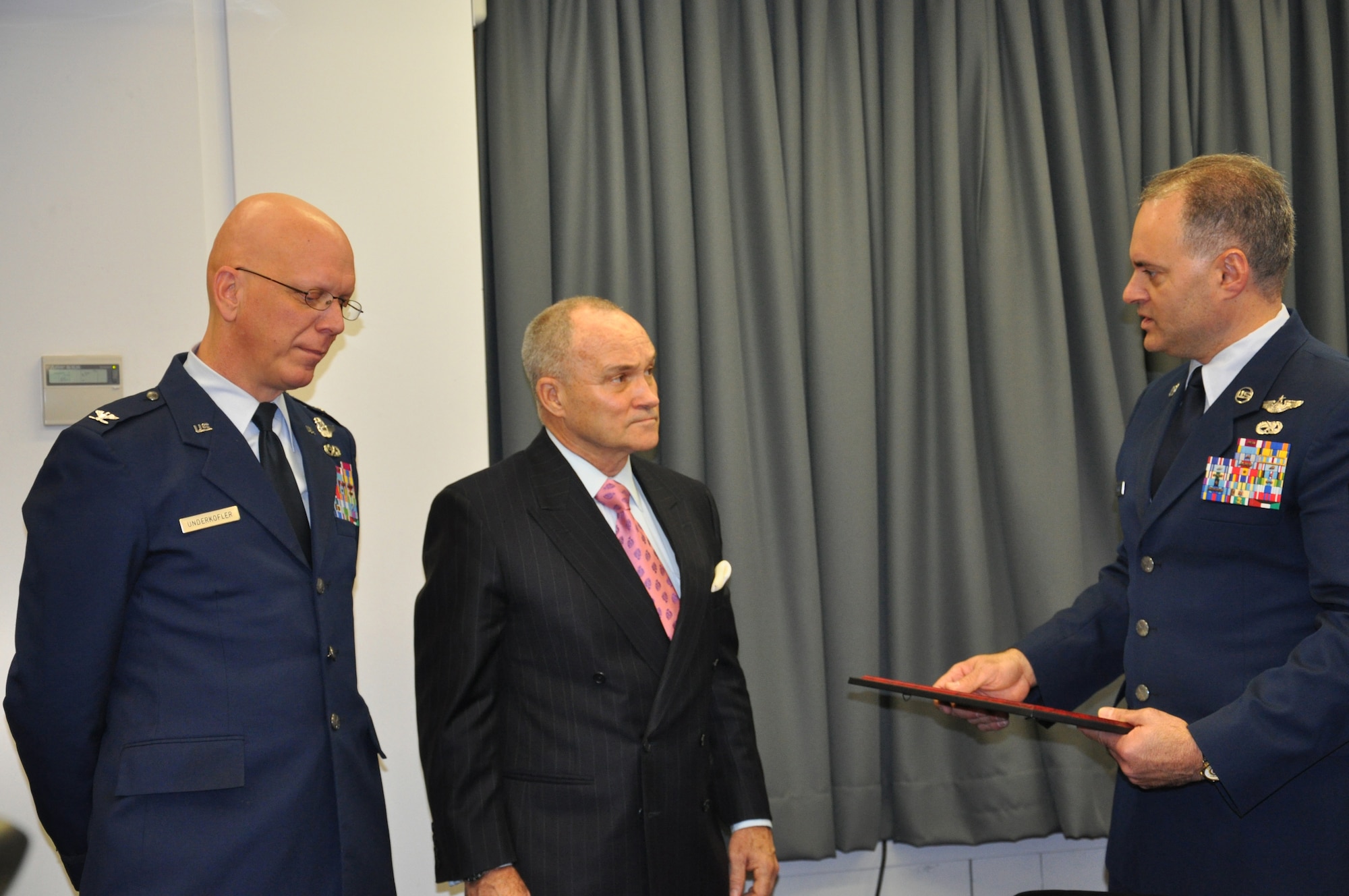JOINT BASE MCGUIRE-DIX-LAKEHURST, N.J. -- Col. Michael Underkofler, (left) vice wing commander and Command Chief Master Sergeant, Michael Ferraro, both of the 514th Air Mobility Wing, here, recognize New York Police Commissioner Raymond W. Kelly for his support of the Air Force Reserve Dc. 13 during a Reserve employer outreach trip to the New York Police Department Headquarters, New York, NY. (U.S. Air Force photo/Master Sgt. Donna T. Jeffries)