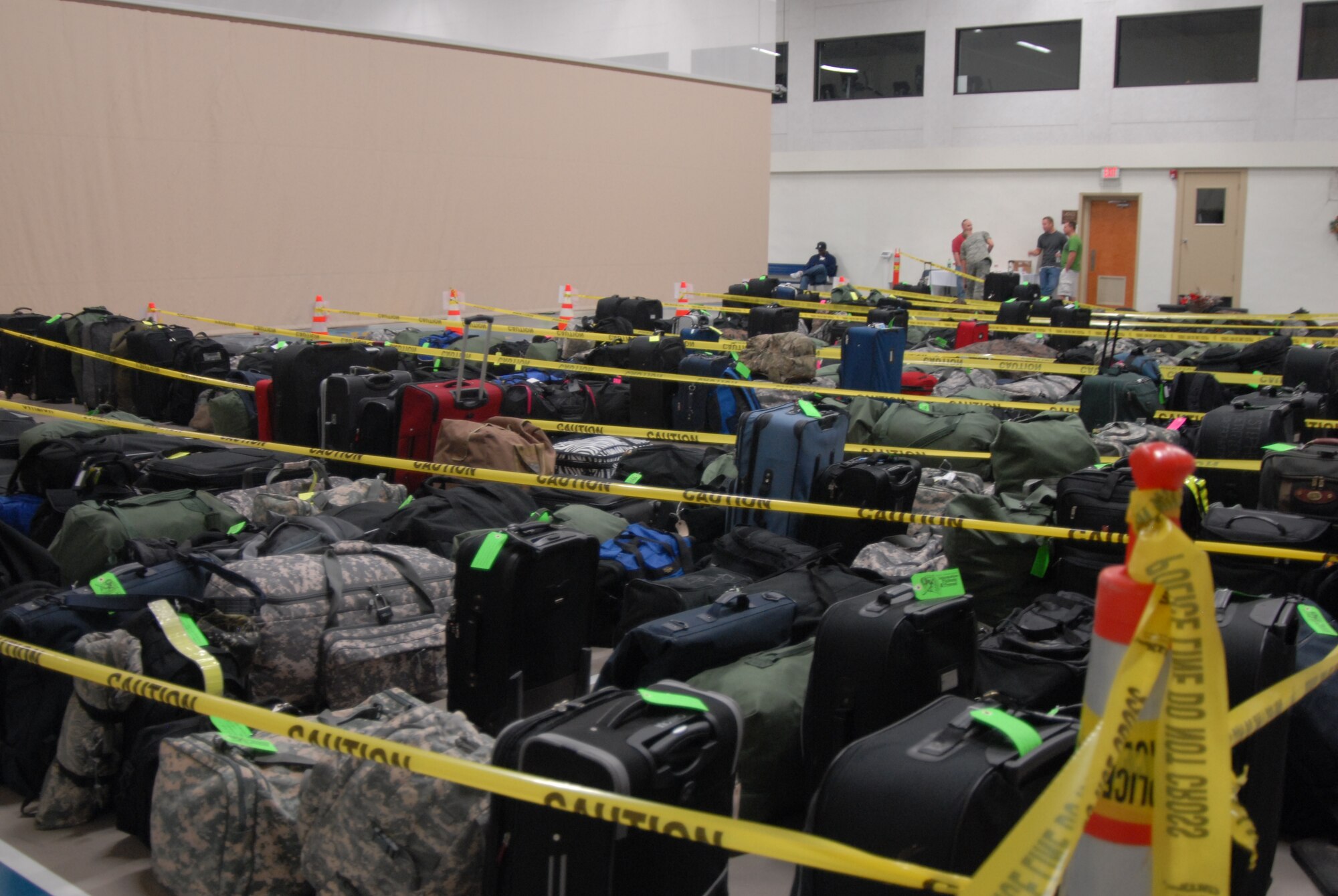 GOODFELLOW AIR FORCE BASE, Texas - Checked in luggage belonging to students fills the basketball court of the Carswell Field House during Exodus held Dec. 21. Exodus is the Air Education and Training Command holiday training stand-down period held to ensure students make it home and return safely from the holidays. It will run through Jan. 2, 2011. (U.S. Air Force photo /Airman 1st Class Anne Gathua) 